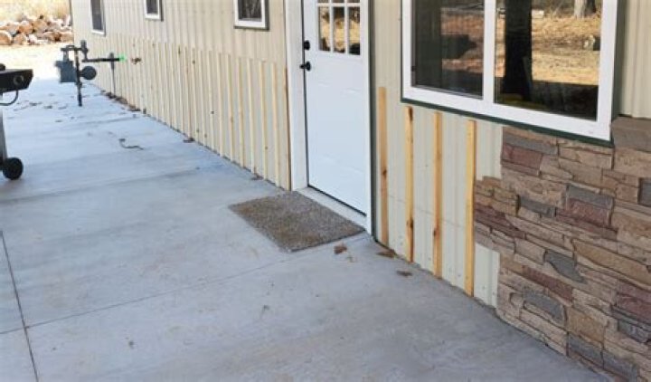 Can you put metal siding over brick?