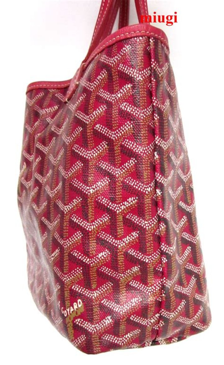 Does Barneys sell Goyard?