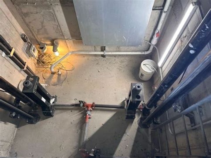 Does building code require sump pump at elevator pit?