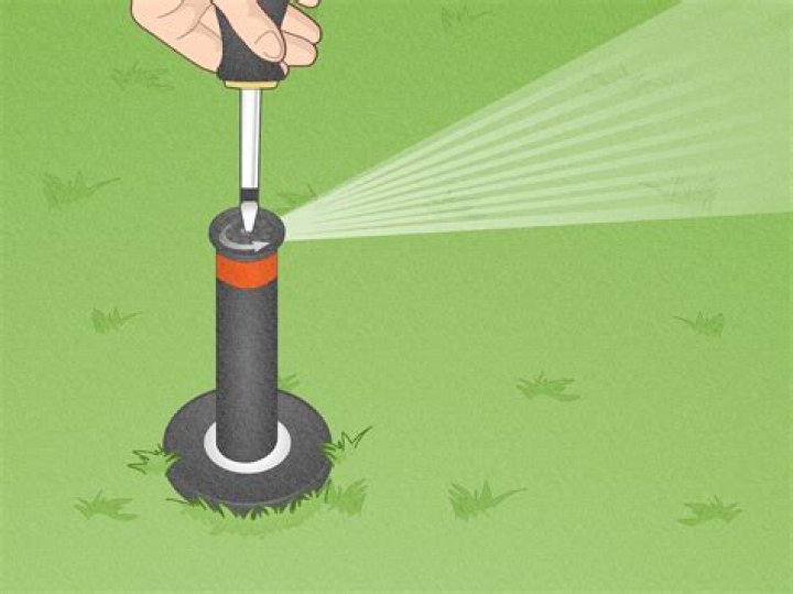 How do I adjust the height of my sprinklers?