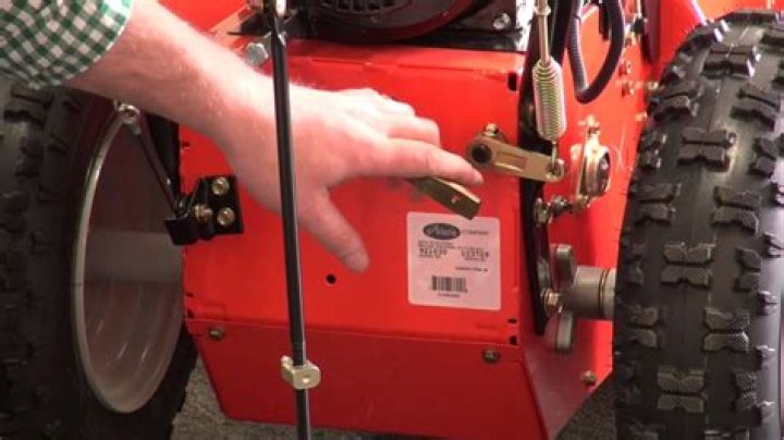 How do you adjust a clutch cable on a snowblower?