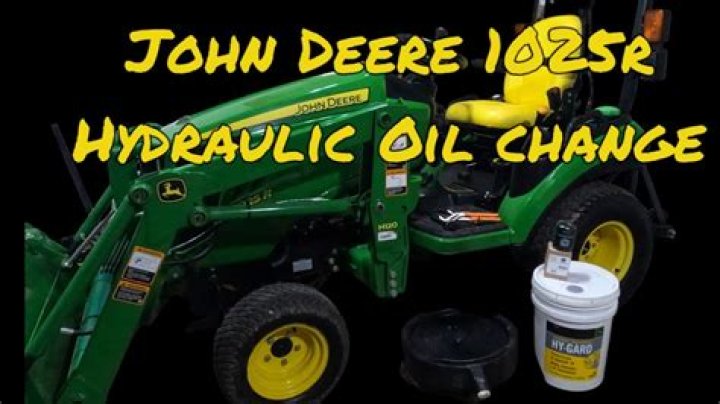 How do you change the oil on a John Deere la105?