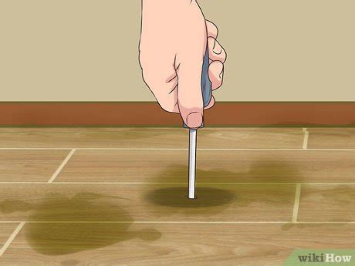 How do you remove mold from laminate flooring?