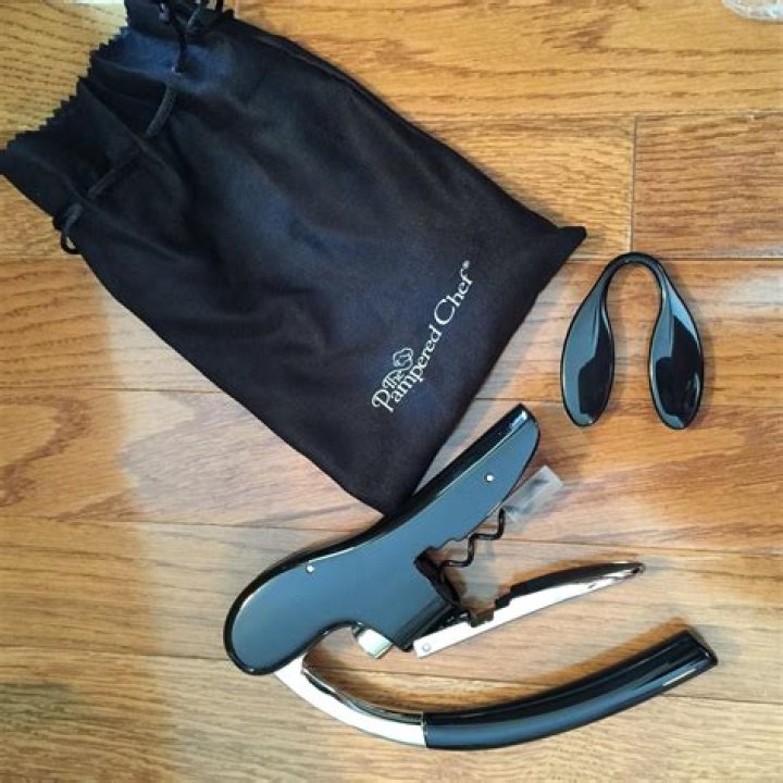 How do you use the Pampered Chef wine bottle opener?