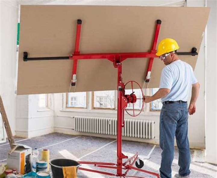 How does a drywall panel hoist work?