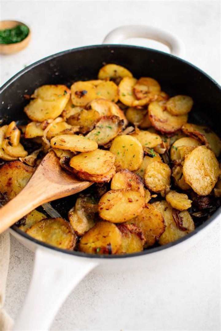 How many carbs in fried potatoes and onions?