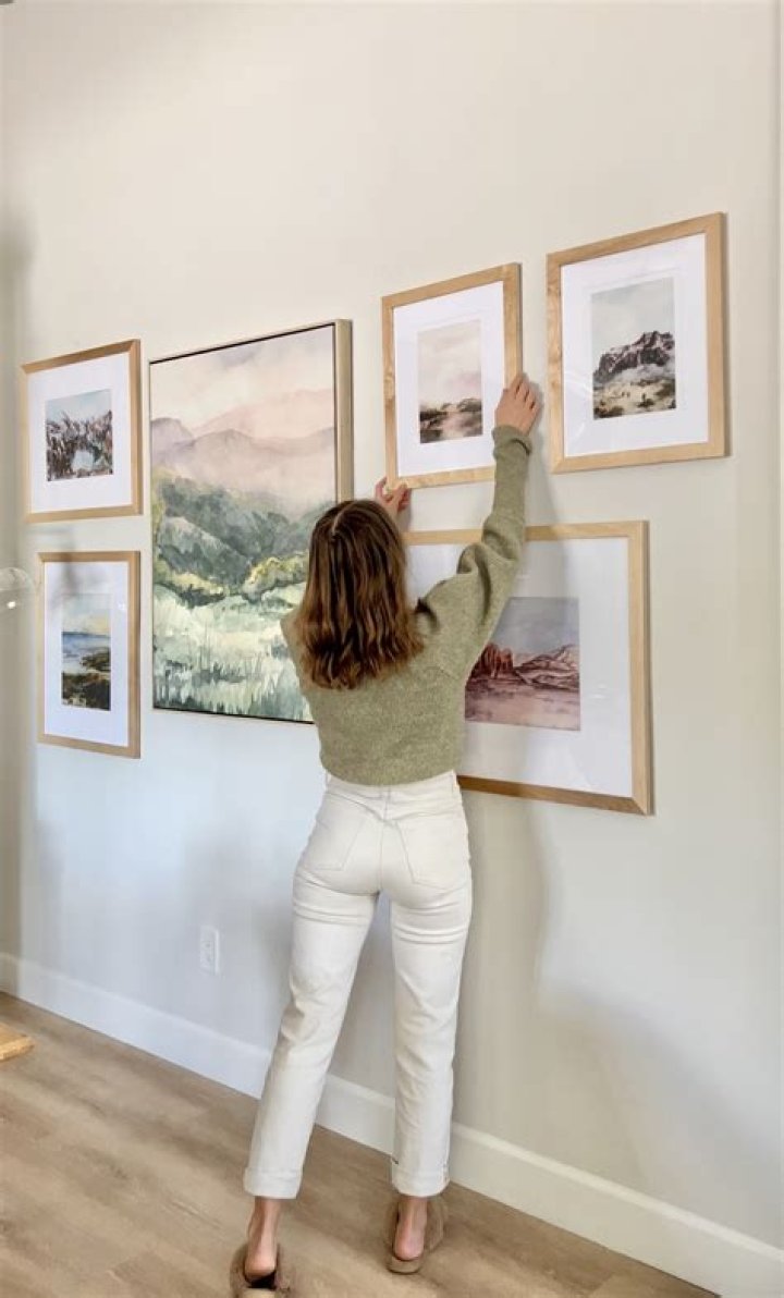 How many pictures should I hang on a wall?