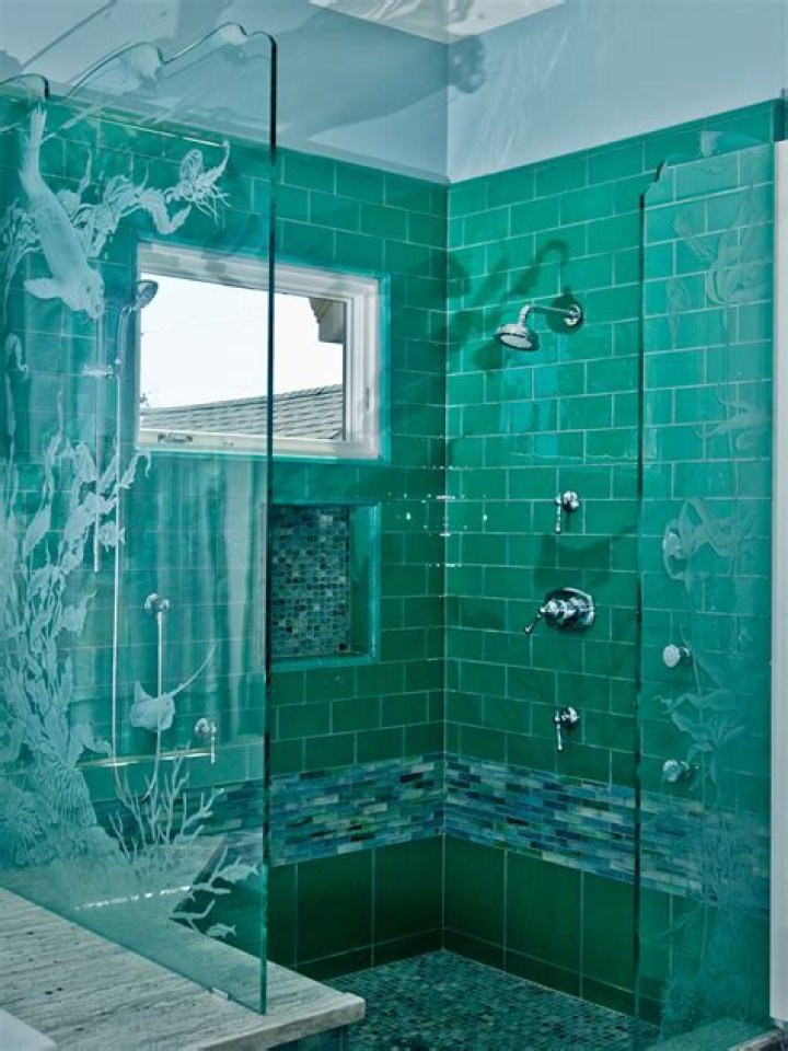 What causes etching on glass shower doors?