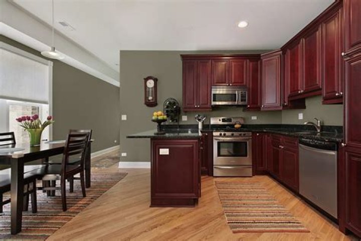 What color paint goes well with dark cabinets?