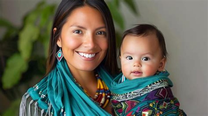 What did Cherokee mothers carry their babies in?