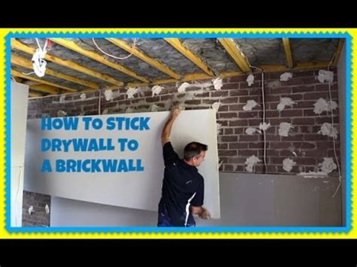 What do you use to stick plasterboard to a wall?