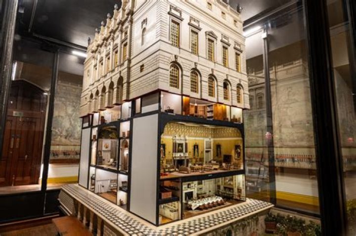 What does the doll symbolize in a doll's house?