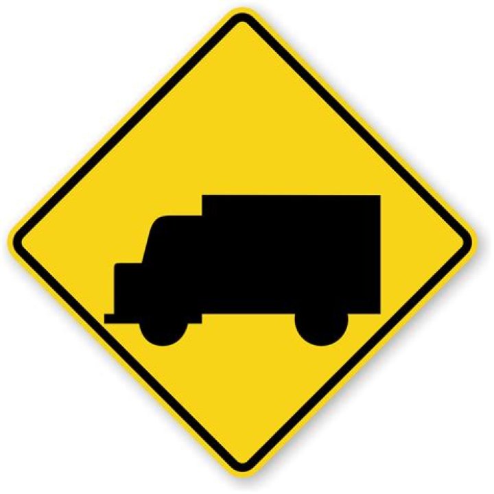 What does the road sign with the truck on it mean?