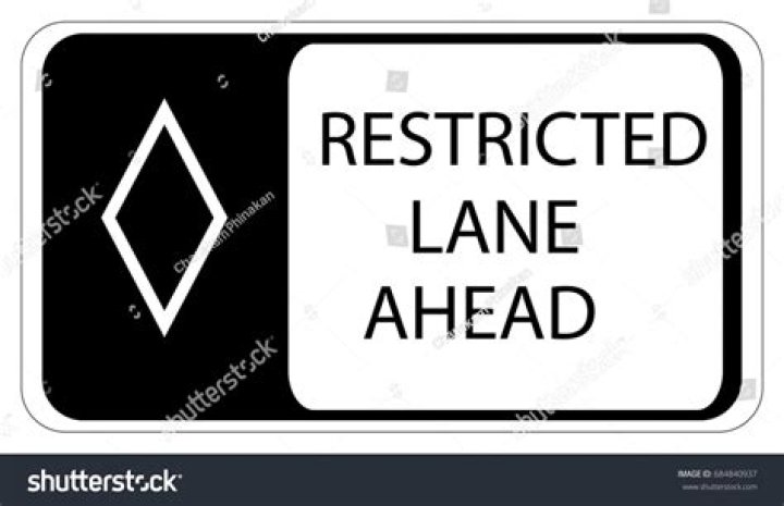 What does this sign mean restricted lane ahead?