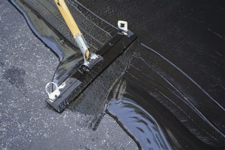 What is Asphalt Sealcoating made of?