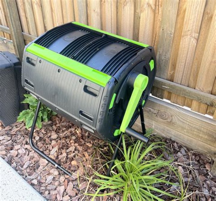 When should I stop adding to my compost tumbler?