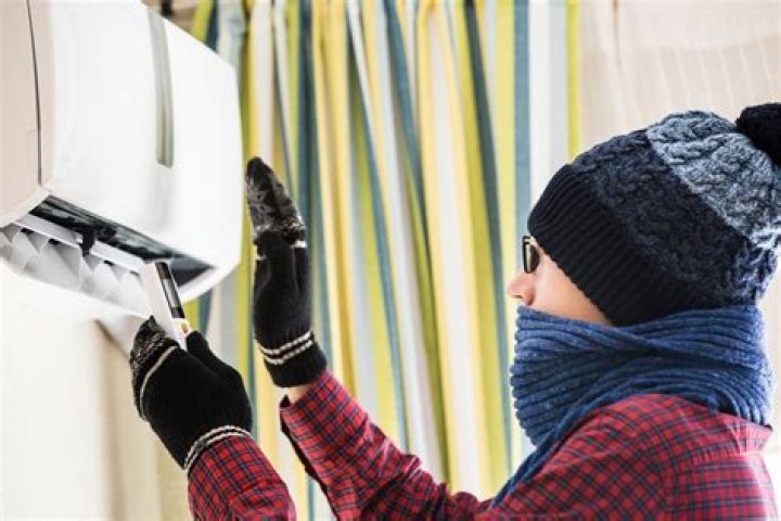 Where should I store my air conditioner in the winter?