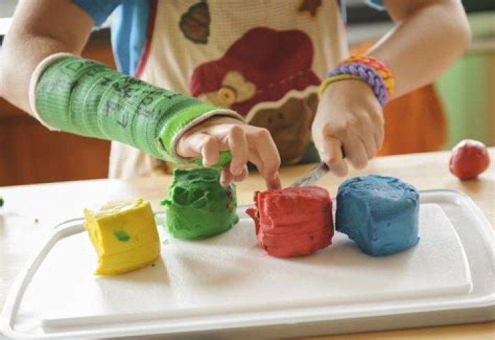 Why did Noah McVicker invented Play Doh?